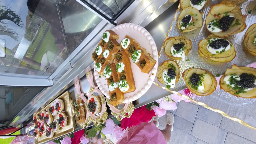 The spread laid along the Chariot window: mirrors, waffles and potato stacks